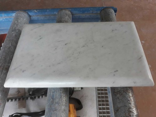 Carrara white marble cutting